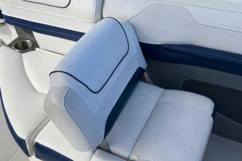 Slide: The Image of 2015 Formula 240 Bowrider boat interior with cup holders and control panel. - 7
