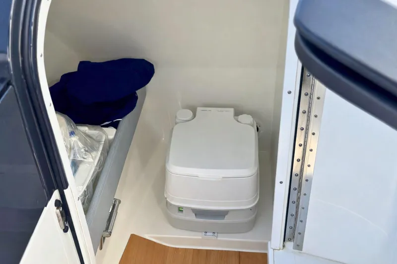 Slide: The Image of 2015 Formula 240 Bowrider dashboard with steering wheel and gauges. - 9