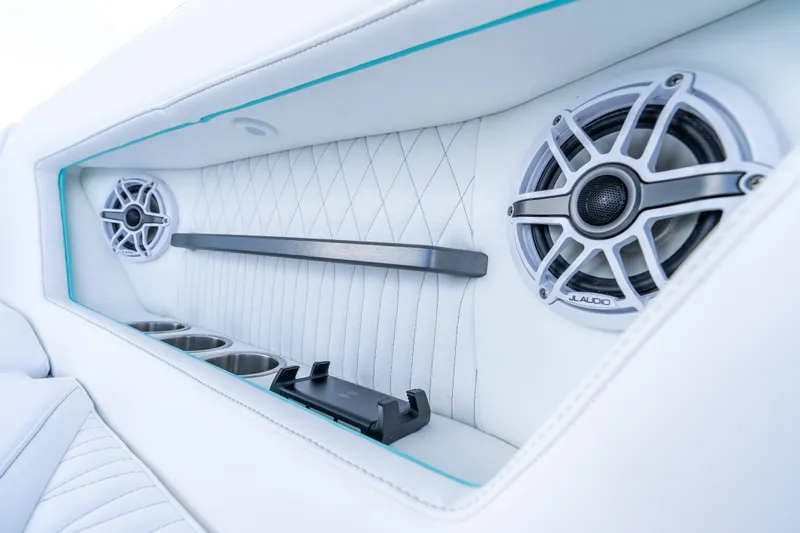 Slide: The Image of Luxurious interior of 2024 Dynamic D-305V with premium speakers and cup holders. - 12