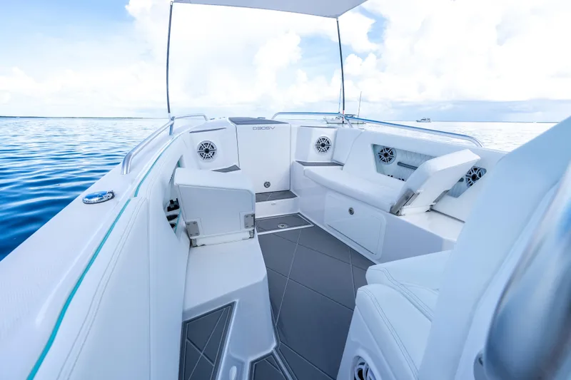 Slide: The Image of Luxurious 2024 Dynamic D-305V boat interior with sleek seating and ocean view. - 9