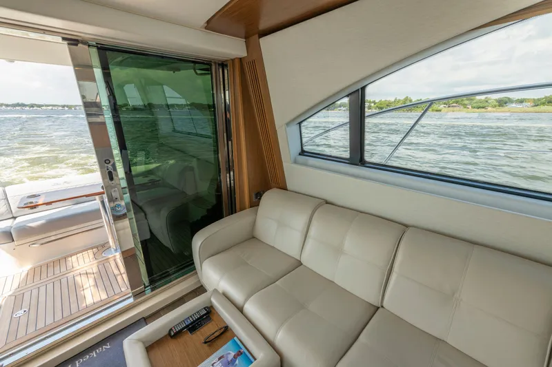 Slide: The Image of Luxurious interior of 2017 Sea Ray Fly 510 yacht with scenic water view. - 32