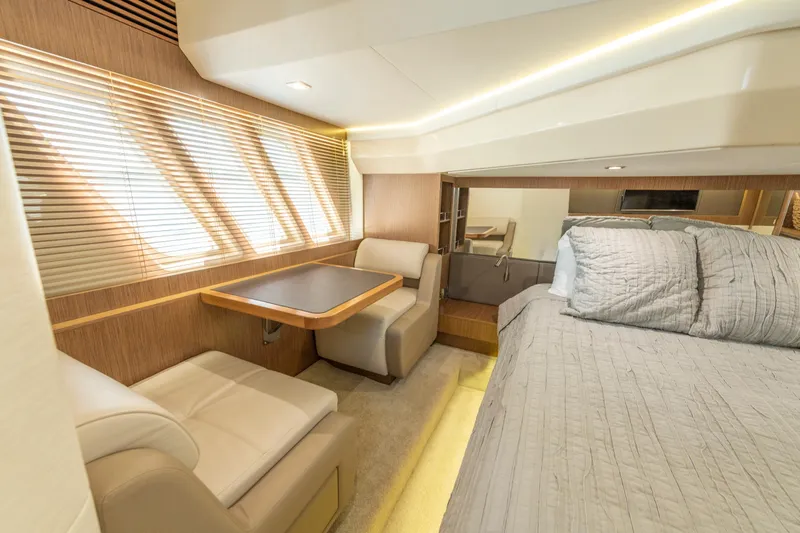 Slide: The Image of Luxurious interior of 2017 Sea Ray Fly 510 yacht with cozy seating and bed. - 48
