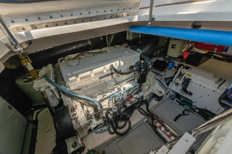Slide: The Image of Engine room of 2017 Sea Ray Fly 510 yacht, showcasing mechanical components and systems. - 88