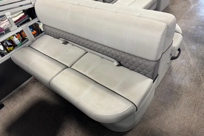 Slide: The Image of 2023 Ranger Reata 220F boat seat with gray upholstery and quilted design. - 15