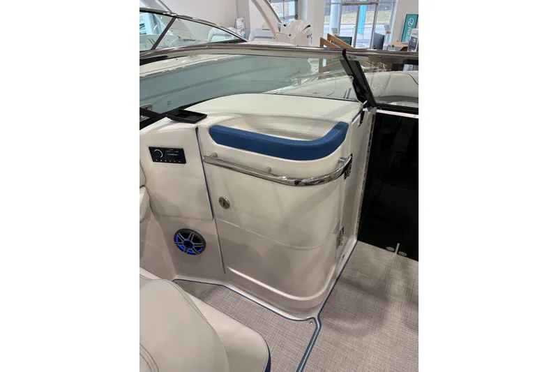 Slide: The Image of 2026 Regal LS6 Surf boat interior with sleek design and modern controls. - 16