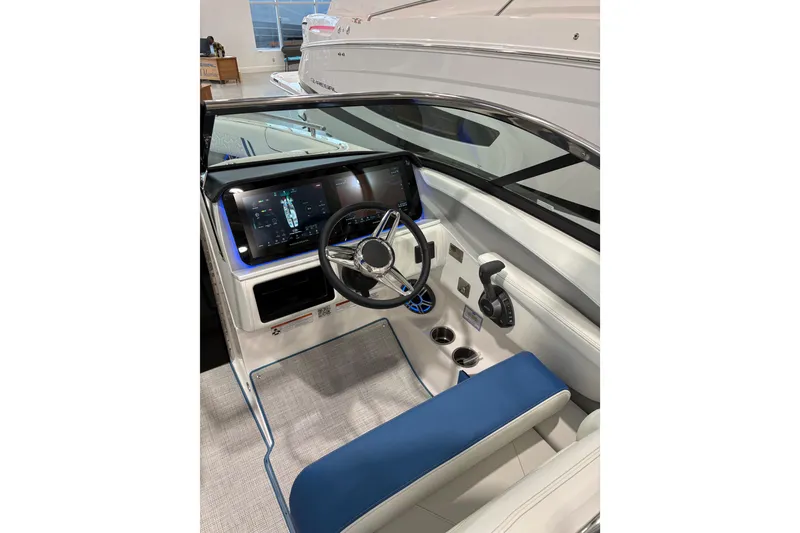 Slide: The Image of 2026 Regal LS6 Surf boat interior with modern dashboard and steering wheel. - 17