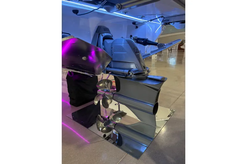 Slide: The Image of 2026 Regal LS6 Surf boat propeller and drive system with vibrant lighting. - 37