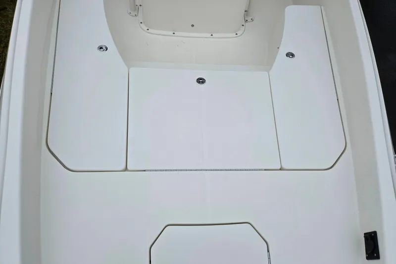 Slide: The Image of 2022 Bayliner Trophy T21Bay boat deck with storage compartments. - 20