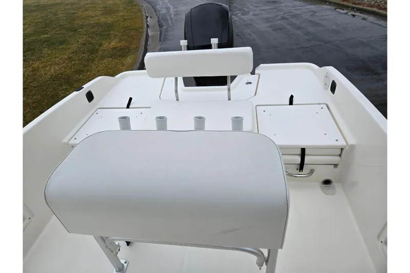 Slide: The Image of 2022 Bayliner Trophy T21Bay boat interior with seating and rod holders. - 25
