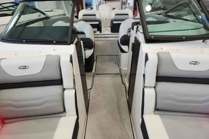 Slide: The Image of 2025 Regal LX6 boat interior with luxurious seating and modern design. - 37
