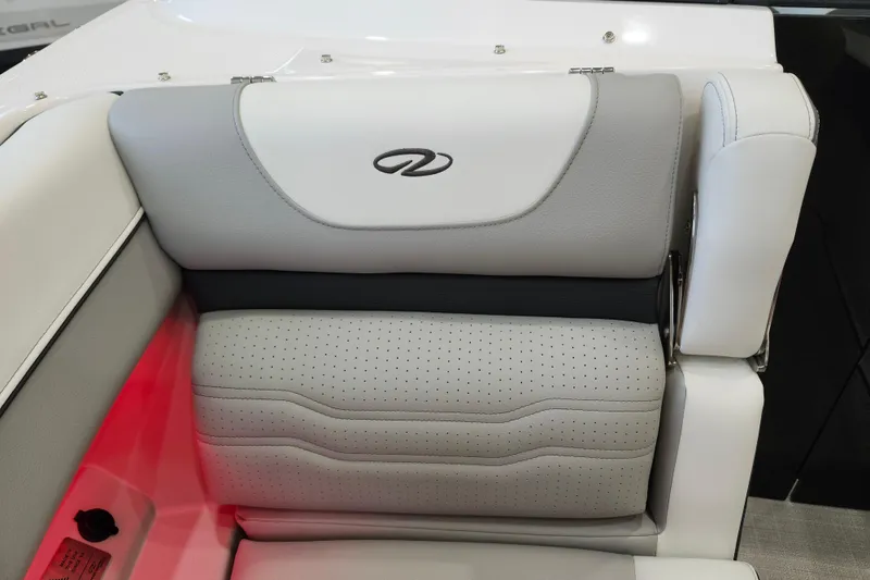 Slide: The Image of 2025 Regal LX6 boat seat with elegant gray upholstery and logo detailing. - 40