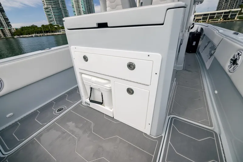 Slide: The Image of 2024 Dynamic D-305DF boat interior with sleek storage compartments and modern design. - 15