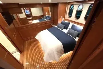 Slide: The Image of Luxurious cabin interior of 2024 Northwest 55 yacht with elegant wood finish. - 67