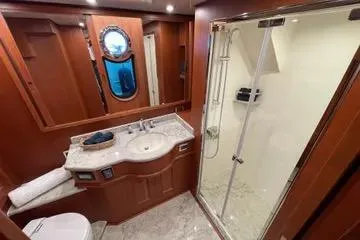 Slide: The Image of Luxurious bathroom in 2024 Northwest 55 yacht with modern shower and elegant wood finishes. - 71