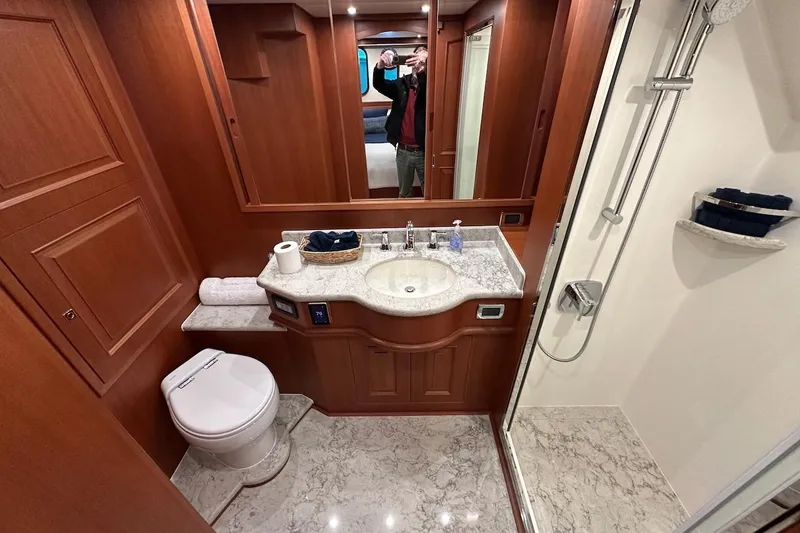 Slide: The Image of Luxurious bathroom in 2024 Northwest 55 yacht with marble countertop and modern shower. - 72