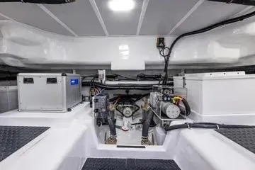 Slide: The Image of 2024 Northwest 55 boat engine room with advanced equipment and wiring. - 92
