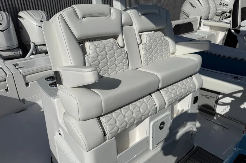 Slide: The Image of Luxurious seating on 2026 Tidewater 3100 Carolina Bay boat, featuring elegant design and comfort. - 7