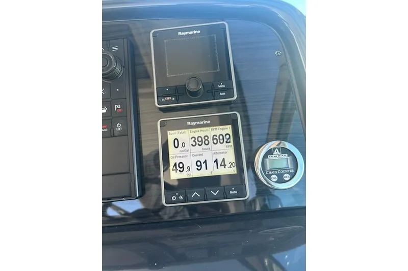 Slide: The Image of Dashboard of 2018 Formula 40 Performance Cruiser with Raymarine displays and chain counter. - 12