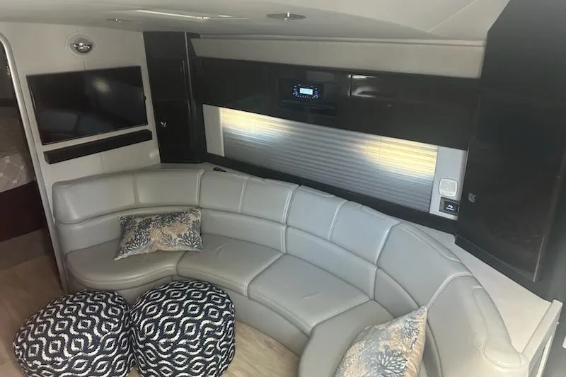 Slide: The Image of 2018 Formula 40 Performance Cruiser interior with curved seating and modern decor. - 14