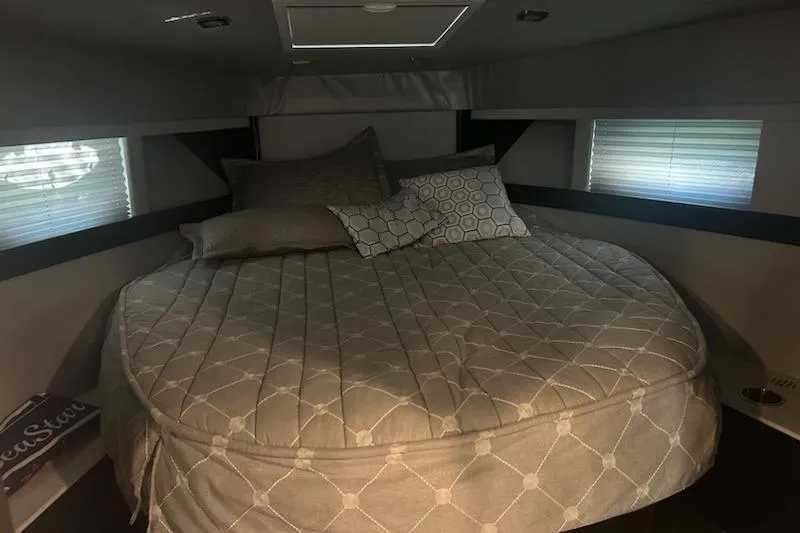 Slide: The Image of Cozy cabin interior of 2018 Formula 40 Performance Cruiser with comfortable bedding. - 17