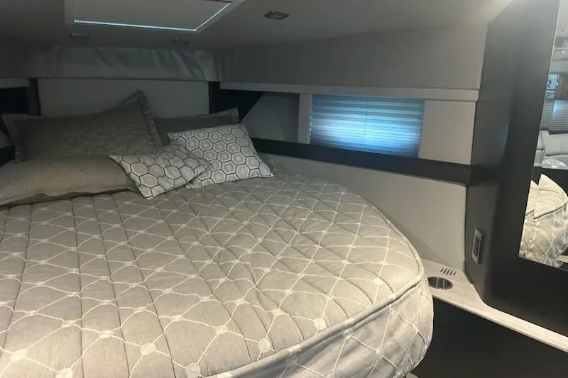 Slide: The Image of Interior cabin of 2018 Formula 40 Performance Cruiser with cozy bed and pillows. - 18