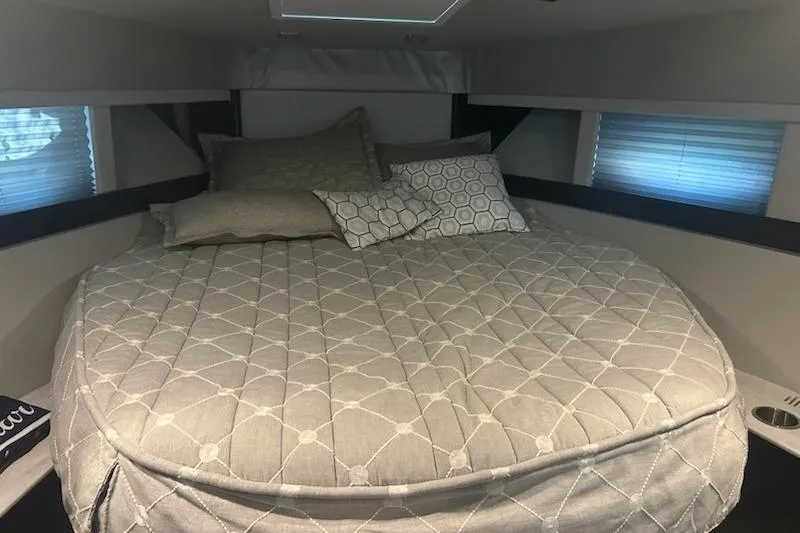 Slide: The Image of 2018 Formula 40 Performance Cruiser cabin with cozy bed and pillows. - 19