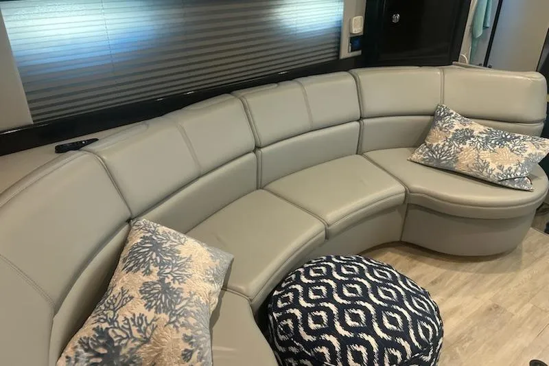 Slide: The Image of Luxurious interior of 2018 Formula 40 Performance Cruiser with curved seating and decorative pillows. - 22