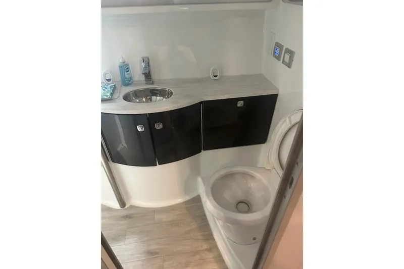Slide: The Image of 2018 Formula 40 Performance Cruiser bathroom with modern sink and toilet. - 27