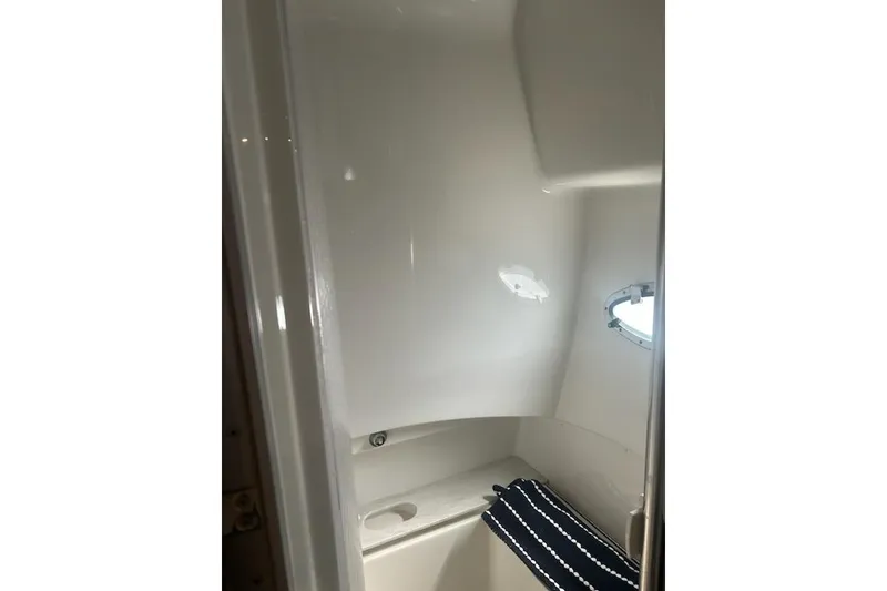 Slide: The Image of Interior of 2018 Formula 40 Performance Cruiser bathroom with window and towel. - 29