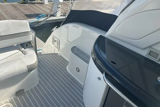 Slide: The Image of 2018 Formula 40 Performance Cruiser deck with seating and sleek design. - 8