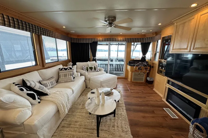 Slide: The Image of Luxurious 2005 Sumerset 16x68 houseboat interior with elegant living area and modern amenities. - 3
