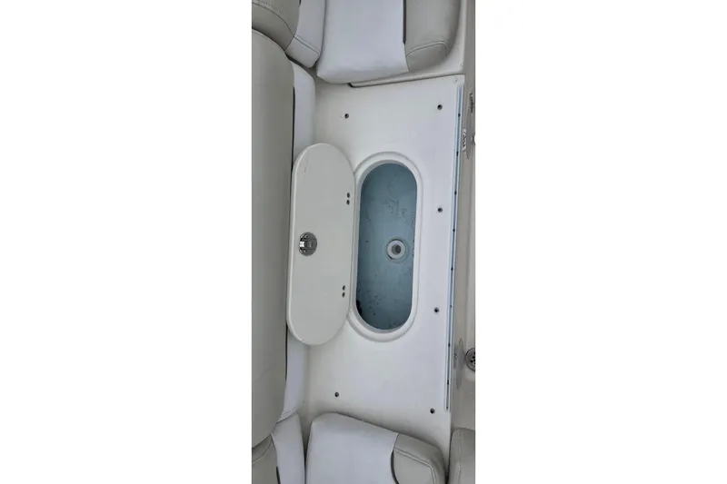 Slide: The Image of 2020 Key West 239 DFS boat interior with open storage compartment. - 14