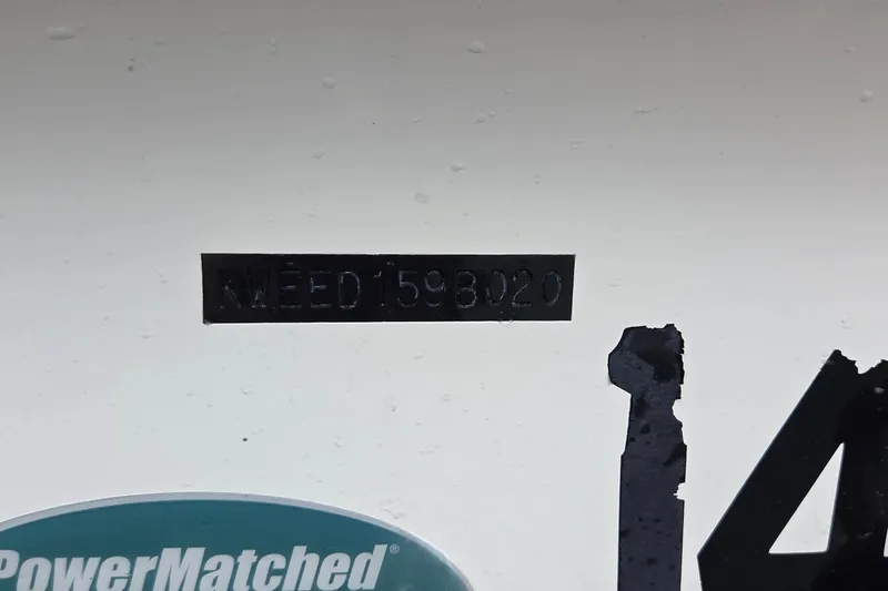 Slide: The Image of 2020 Key West 239 DFS boat hull identification number, KWED 159B020, with PowerMatched sticker. - 16