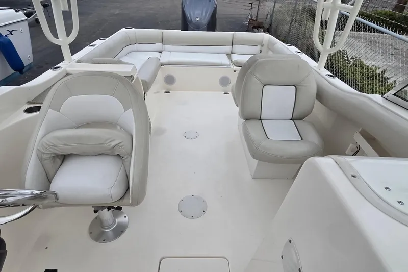 Slide: The Image of 2020 Key West 239 DFS boat interior with white seating and spacious layout. - 5