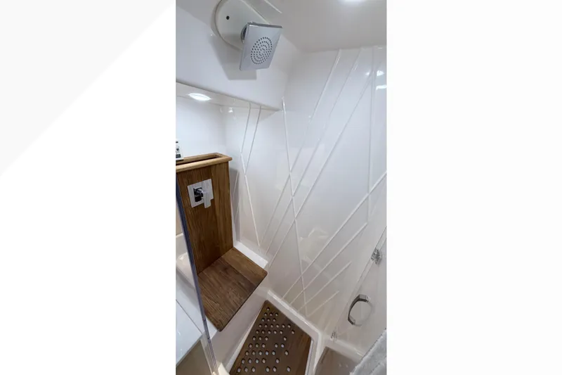 Slide: The Image of Interior view of a 2026 Regal 38 SAV boat compartment, showcasing sleek design. - 13