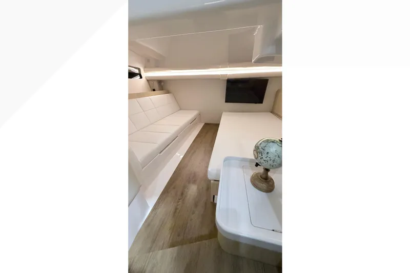 Slide: The Image of Open drawer on a 2026 Regal 38 SAV boat, showcasing interior storage space. - 15