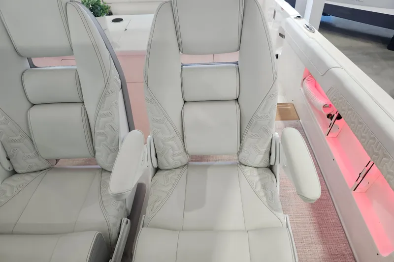 Slide: The Image of Luxurious seating on 2026 Regal 38 SAV boat with elegant white upholstery. - 20