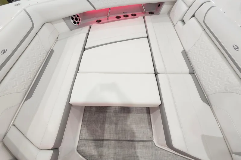 Slide: The Image of Luxurious seating area on 2026 Regal 38 SAV boat with elegant white upholstery. - 34
