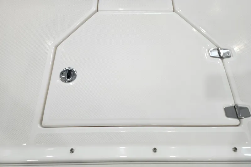 Slide: The Image of 2026 Regal 38 SAV boat hatch with chrome handle and hinges. - 36