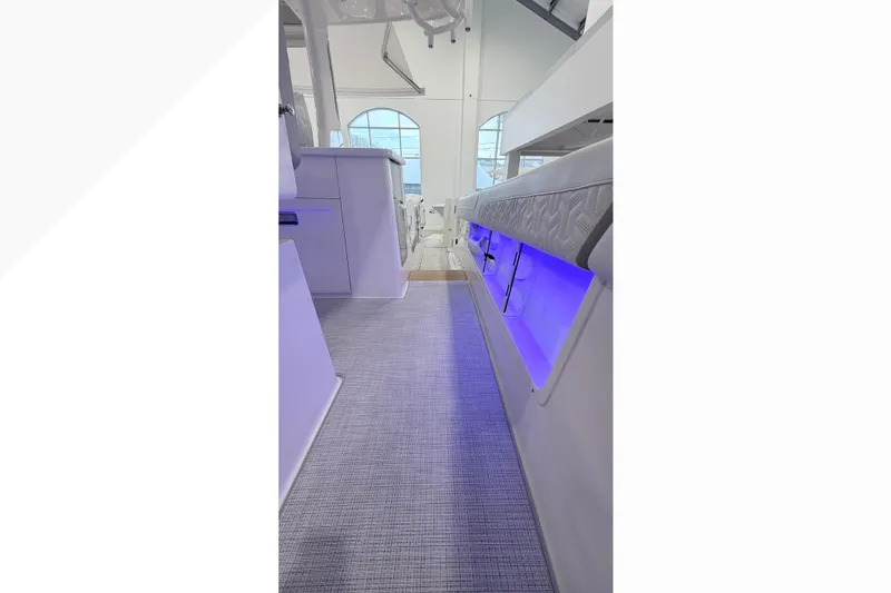 Slide: The Image of Modern interior of 2026 Regal 38 SAV boat with sleek surfaces and potted plant. - 7