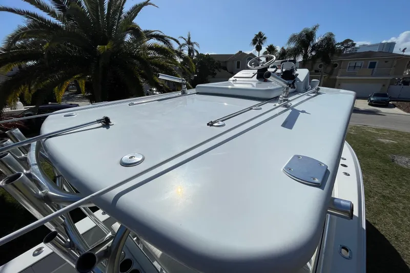 Slide: The Image of 2008 Contender 27 Tournament boat with dual outboard motors, viewed from above. - 20