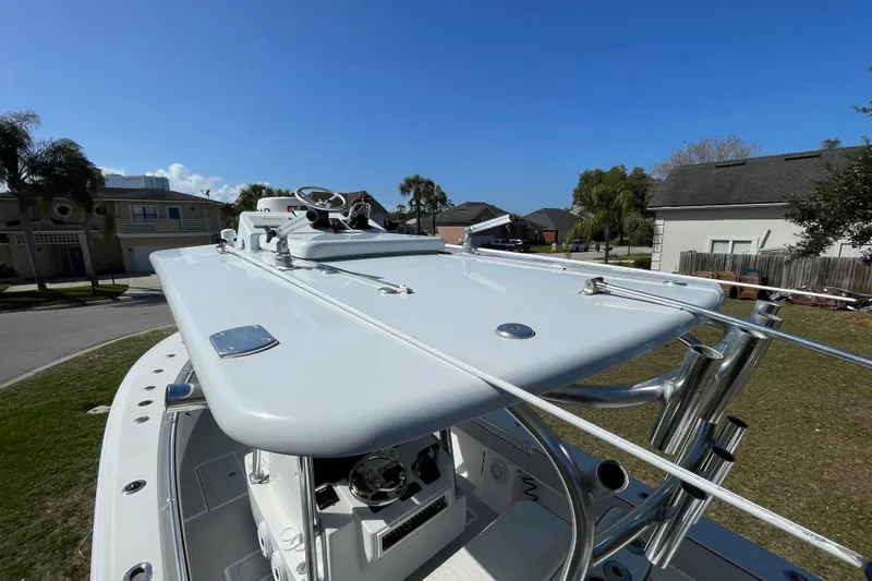Slide: The Image of 2008 Contender 27 Tournament boat interior showing wiring and equipment setup. - 21