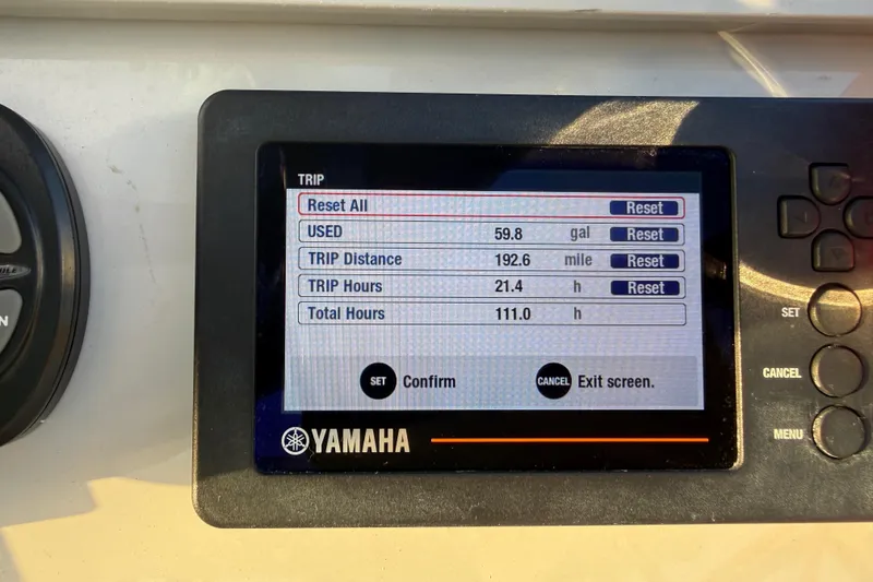 Slide: The Image of Yamaha trip display on 2021 Hewes Redfisher 21, showing fuel and distance data. - 15