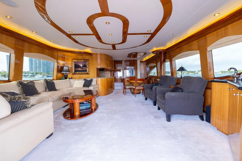 Slide: The Image of 2005 Hatteras 80 Motor Yacht cruising on open sea, rear view. - 14