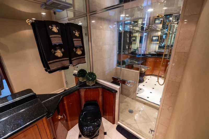 Slide: The Image of Luxurious bedroom interior of 2005 Hatteras 80 Motor Yacht with elegant furnishings. - 35