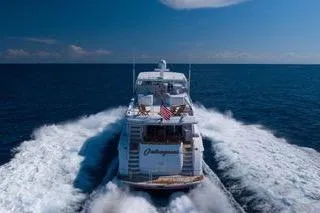 Slide: The Image of Aerial view of 2005 Hatteras 80 Motor Yacht on open water. - 5