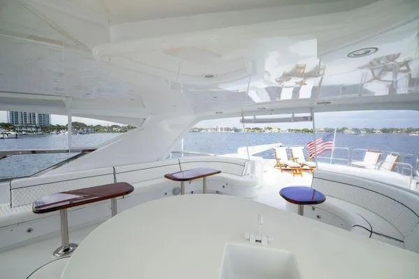 Slide: The Image of Helm of 2005 Hatteras 80 Motor Yacht with advanced navigation systems and controls. - 53