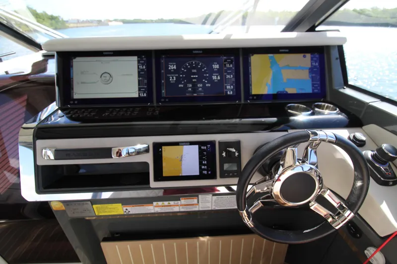 Slide: The Image of Helm of 2025 Saxdor 400 GTS with advanced navigation displays and steering wheel. - 16