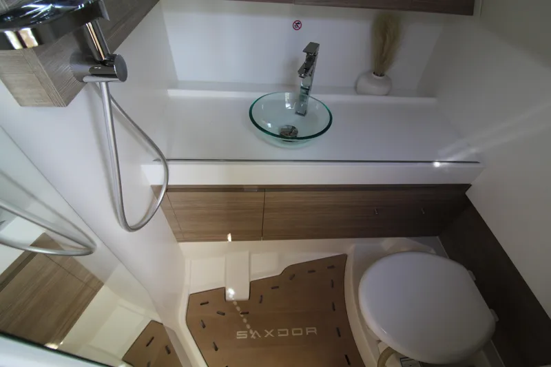 Slide: The Image of Modern bathroom interior of 2025 Saxdor 400 GTS boat, featuring sleek fixtures and minimalist design. - 28