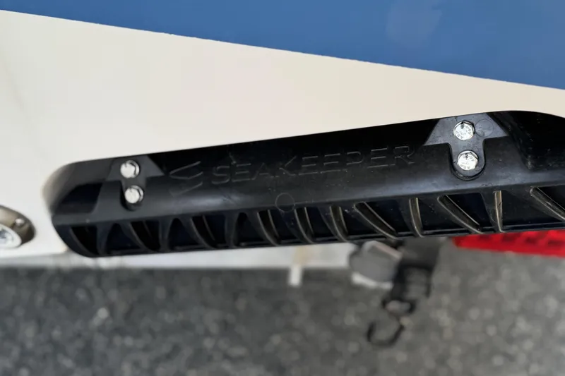 Slide: The Image of Close-up of Seakeeper component on 2026 Sportsman Heritage 261 Center Console boat. - 34